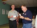 Jon Jerome receives the donation for Operation Home Front from President Marty Dooley